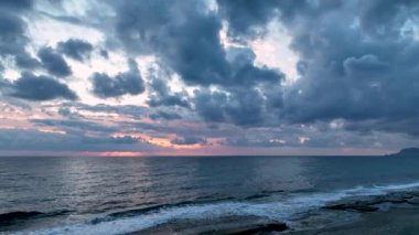 Cloudy sunset at sea