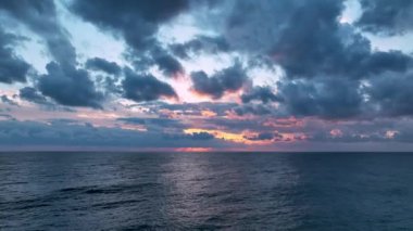 Cloudy sunset at sea