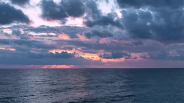 Cloudy sunset at sea
