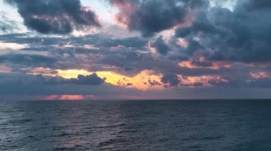 Cloudy sunset at sea
