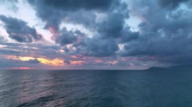 Cloudy sunset at sea