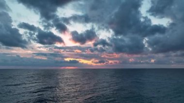 Cloudy sunset at sea