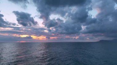 Cloudy sunset at sea