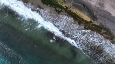 sea filmed on a drone in the sunset