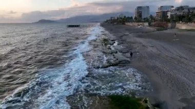 sea filmed on a drone in the sunset