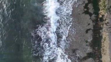 sea filmed on a drone in the sunset