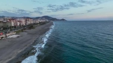sea filmed on a drone in the sunset