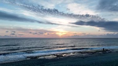 sea filmed on a drone in the sunset