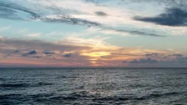 Cloudy sunset at sea
