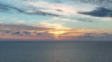 Cloudy sunset at sea