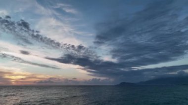 Cloudy sunset at sea