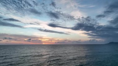 Cloudy sunset at sea