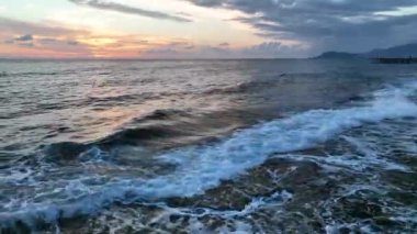 sea filmed on a drone in the sunset