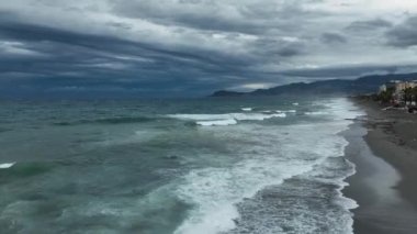 Storm at sea filmed on a drone in the sunset