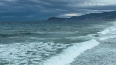 Storm at sea filmed on a drone in the sunset
