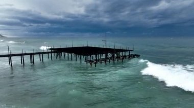 Storm at sea filmed on a drone in the sunset