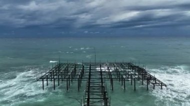 Storm at sea filmed on a drone in the sunset