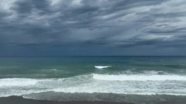 Storm at sea filmed on a drone in the sunset