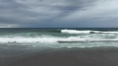 Storm at sea filmed on a drone in the sunset