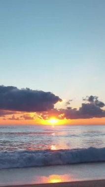 Cloudy sunset at sea