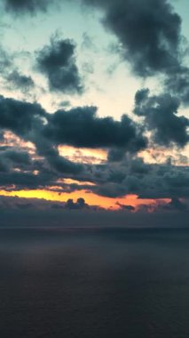 Cloudy sunset at sea