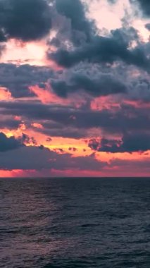 Cloudy sunset at sea