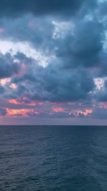Cloudy sunset at sea