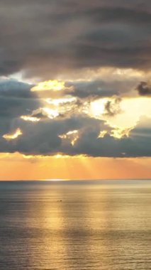Cloudy sunset at sea