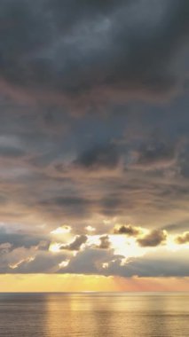 Cloudy sunset at sea