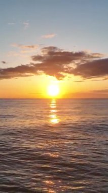 Cloudy sunset at sea
