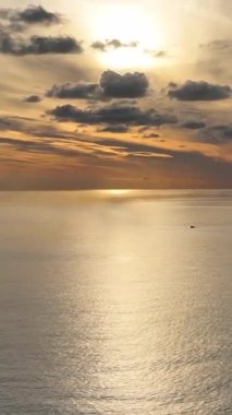 Cloudy sunset at sea