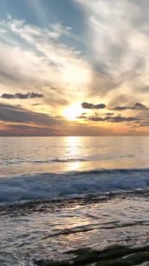 Cloudy sunset at sea