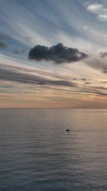 Cloudy sunset at sea