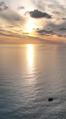 Cloudy sunset at sea