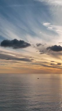 Cloudy sunset at sea