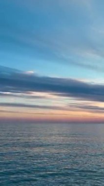 Cloudy sunset at sea