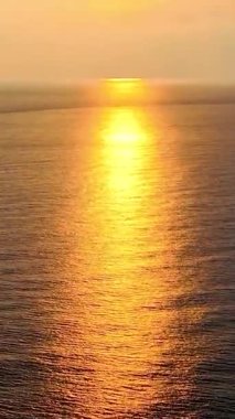 Cloudy sunset at sea