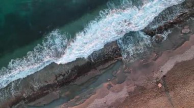 sea filmed on a drone in the sunset