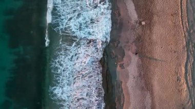 sea filmed on a drone in the sunset