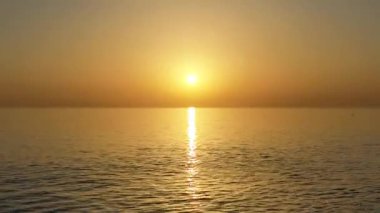 Foggy Mystical sunset over the sea