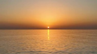 Foggy Mystical sunset over the sea