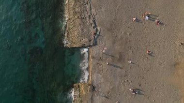 Sea waves on the beautiful beach aerial view drone 4k shot.