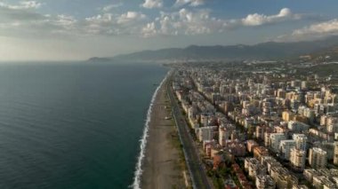 City panorama on the seashore 4K aerial view