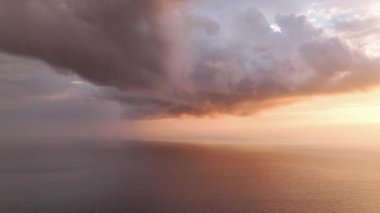 Cloudy sunset at sea colorful colors aerial view