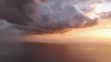Cloudy sunset at sea colorful colors aerial view