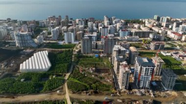 City panorama on the seashore 4K aerial view