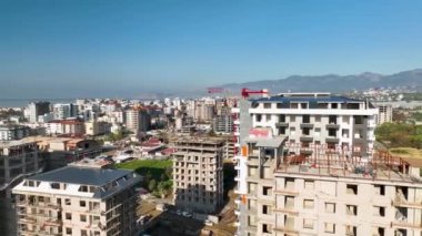 City panorama on the seashore 4K aerial view