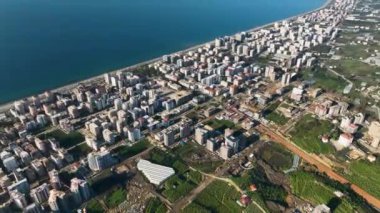 City panorama on the seashore 4K aerial view
