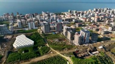 City panorama on the seashore 4K aerial view