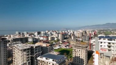 City panorama on the seashore 4K aerial view